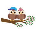 Cute owls boy and girl on a tree branch vector illustration